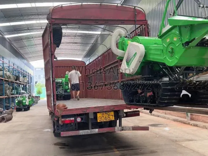 Loading combine harvester machine to the truck