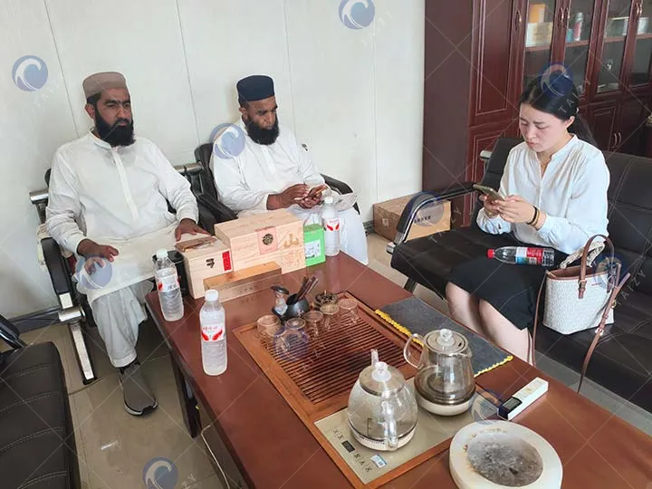 office chatting with tea