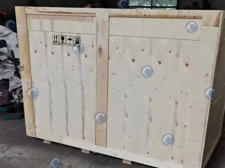 multi-grain threshing machine in wooden crate